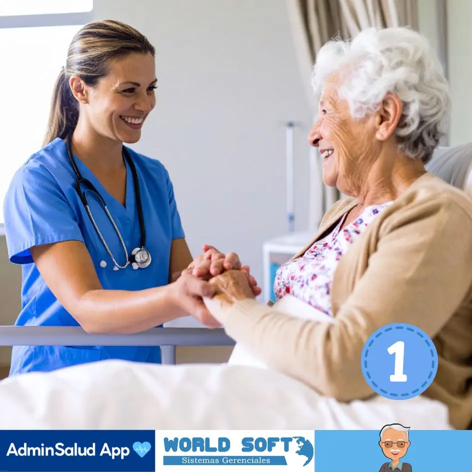 mujer de la tercera edad en una cama de hospital es atendida por una auxiliar de enfermería